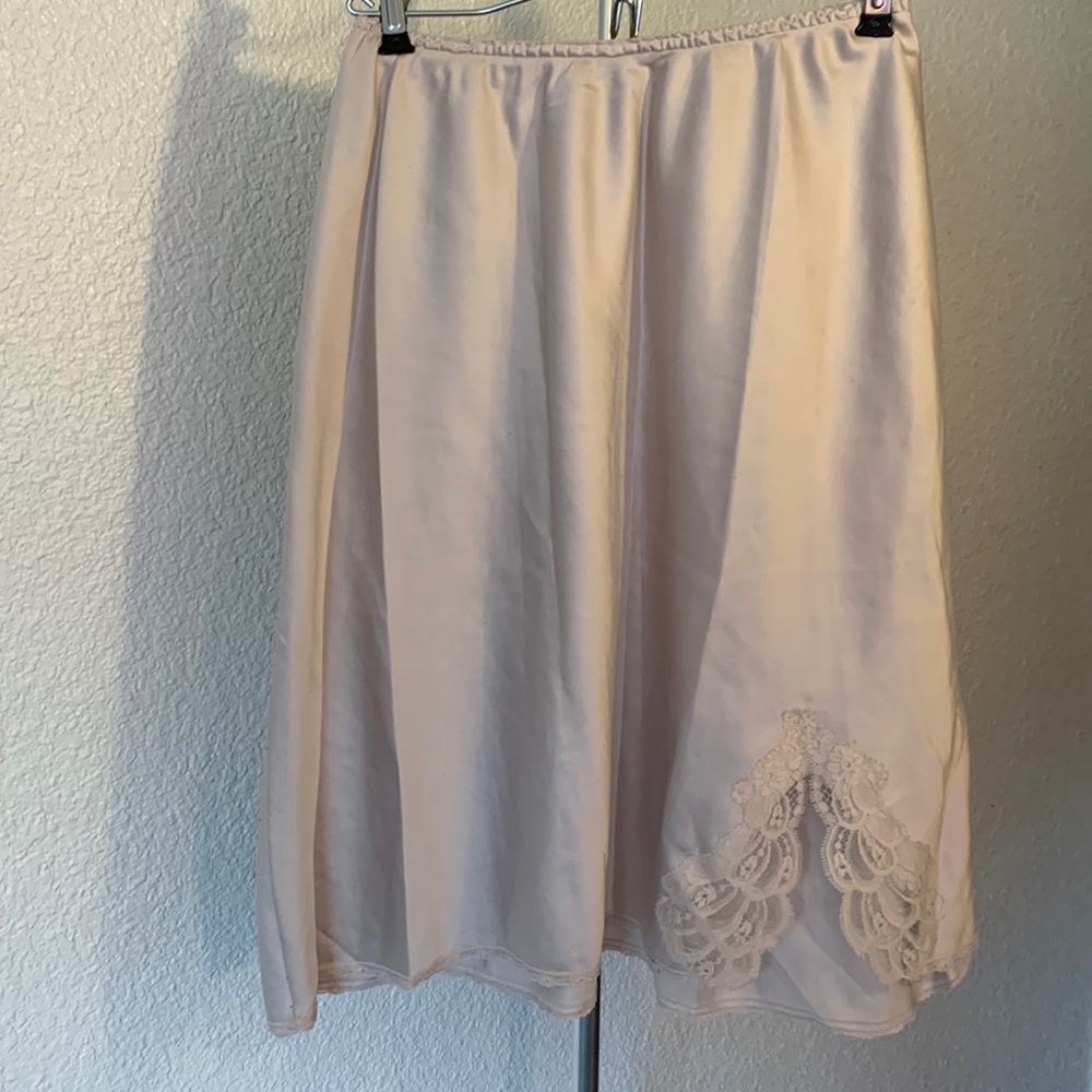 Warner’s half slip with a slit upfront with lace